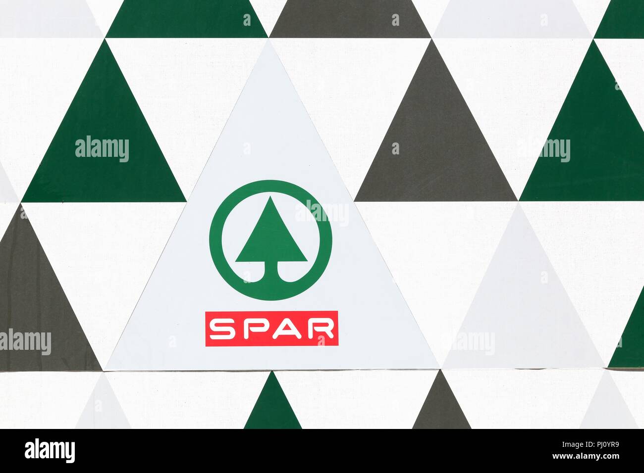 Sete, France - July 3, 2018: Spar logo on a wall. Spar is an international group of independently owned and operated retailers and wholesalers Stock Photo