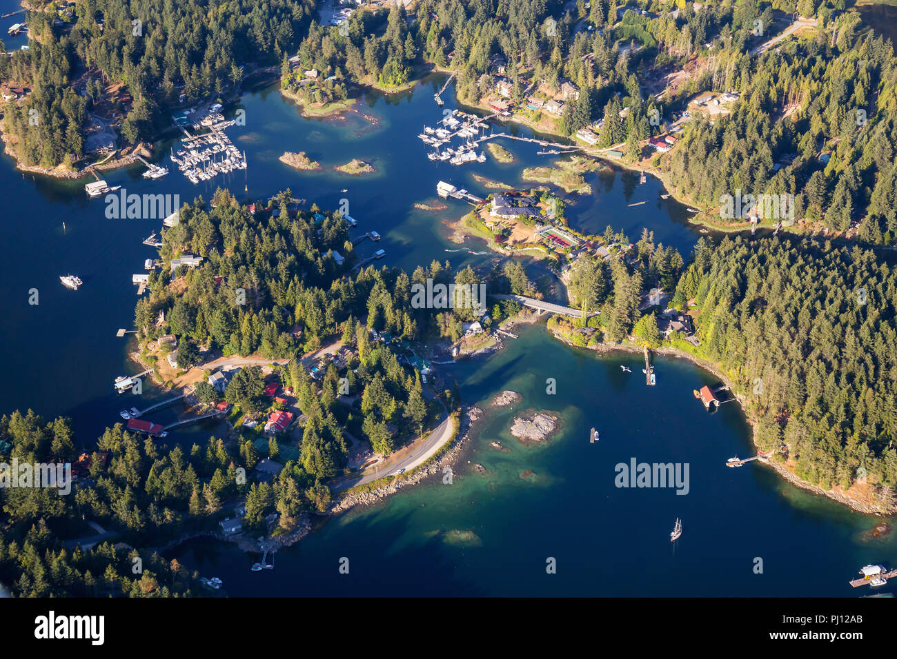 Aerial view of Madeira Park during a sunny summer day. Taken in