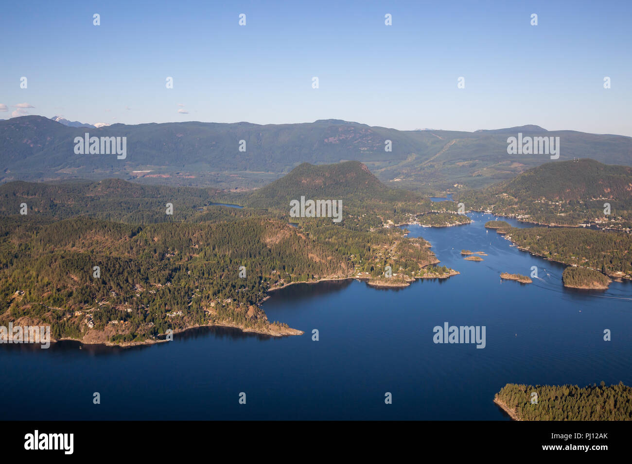 Aerial view of Madeira Park during a sunny summer day. Taken in