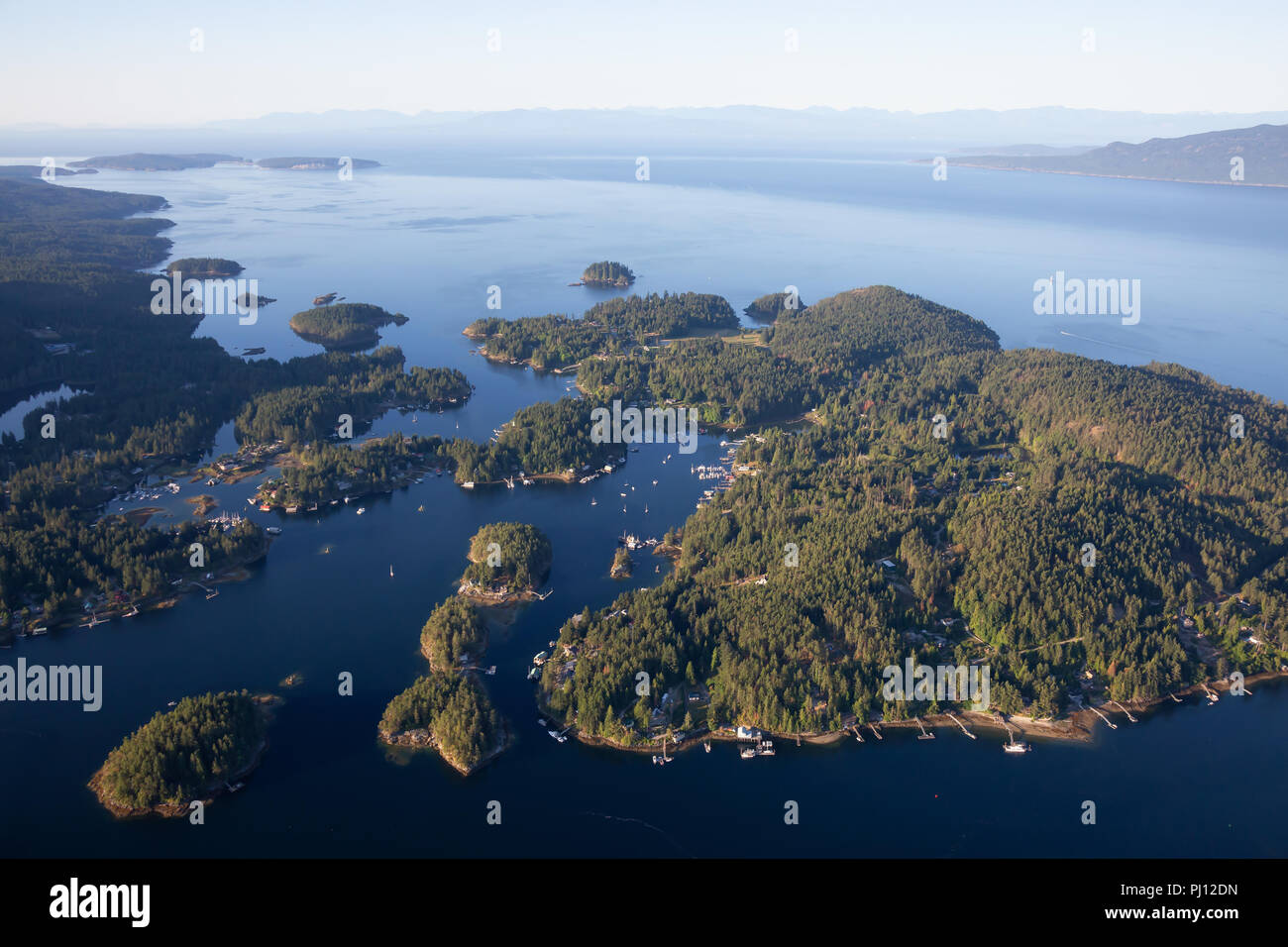 Aerial view of Madeira Park during a sunny summer day. Taken in
