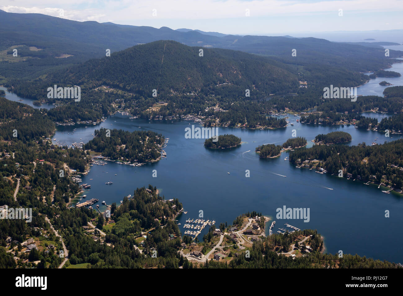 Aerial view of Madeira Park during a sunny summer day. Taken in