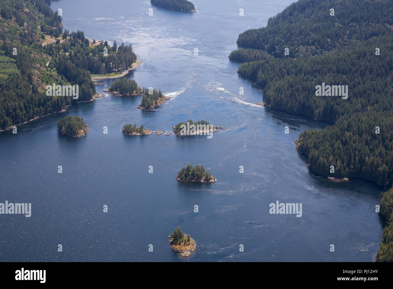 Aerial view of Skookumchuck Narrows during a vibrant sunny summer day. Located in Sunshine Coast