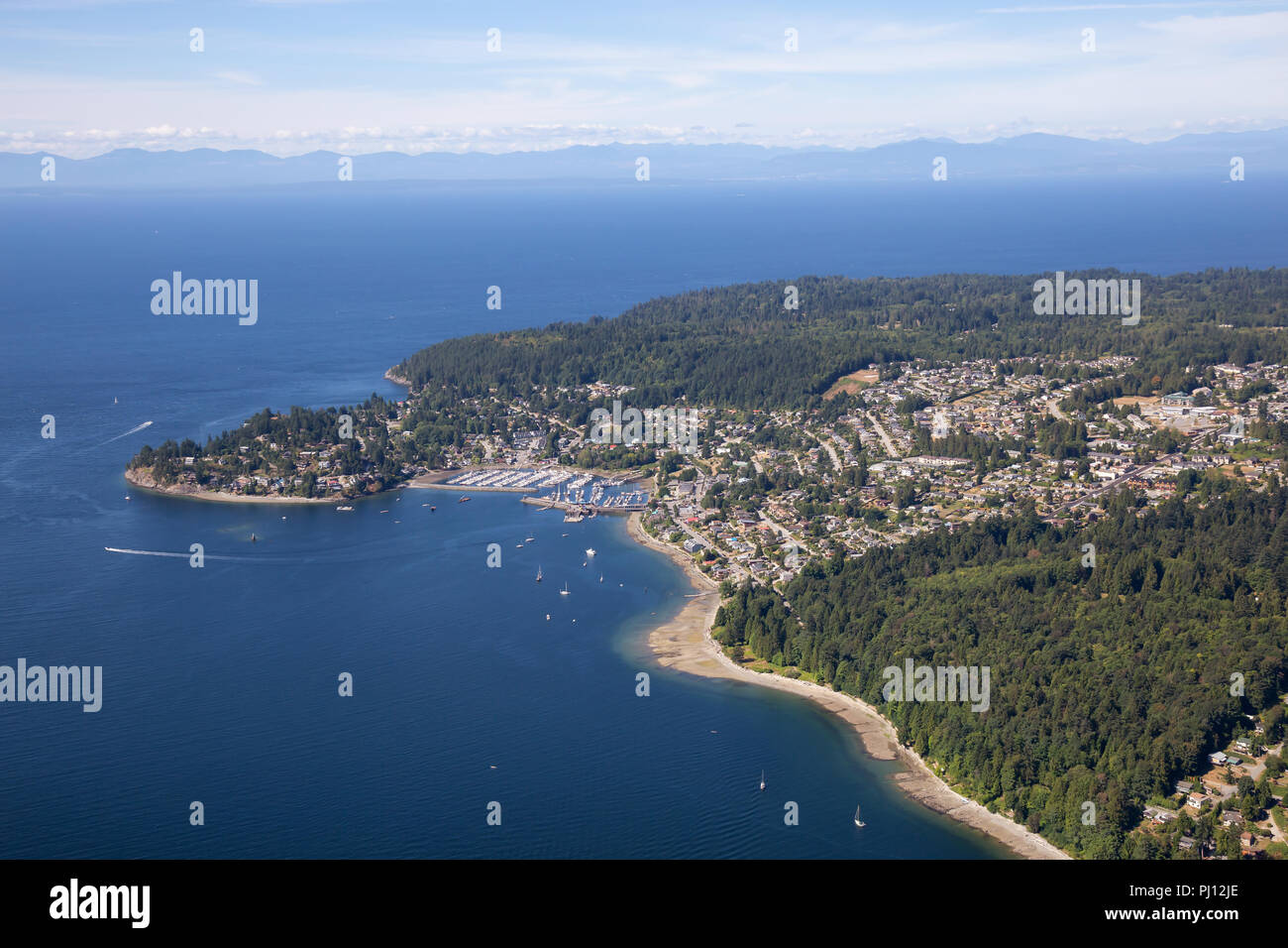 Aerial view of Gibsons during a sunny summer day. Located in Sunshine