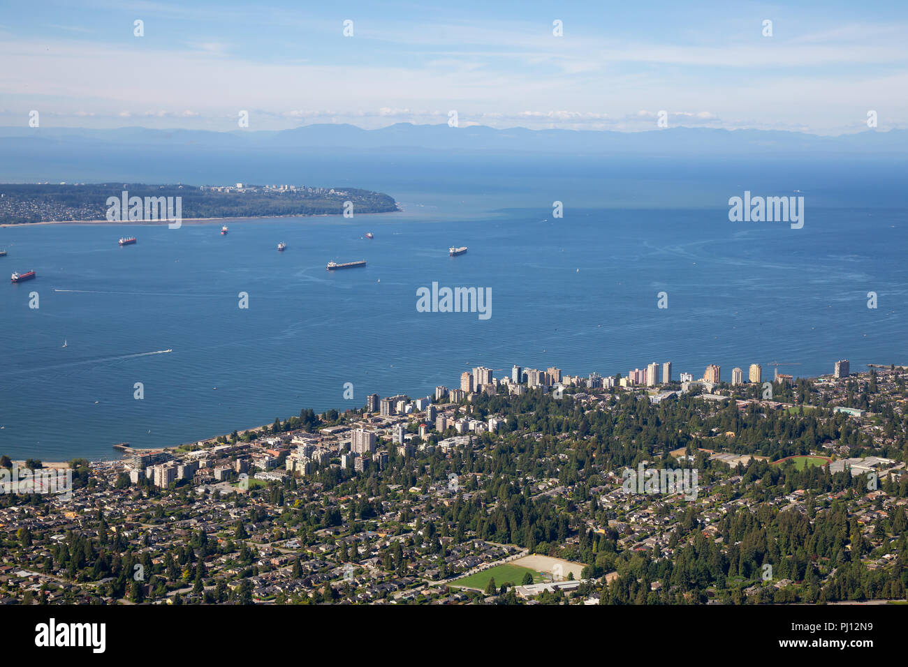 Aerial view of North Vancouver, BC, with Downtown City in the ...
