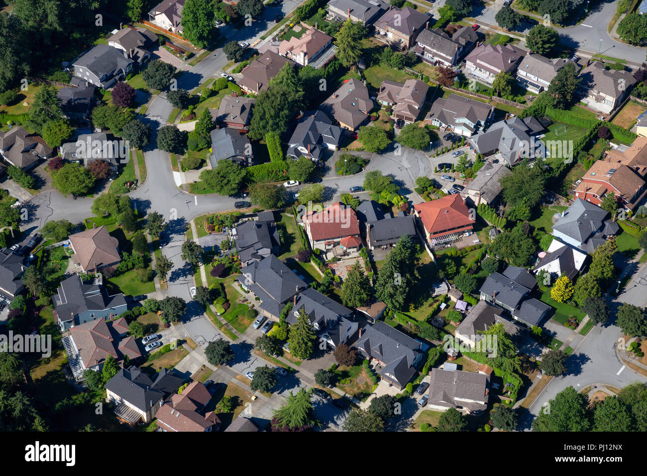 Aerial view of the residential homes in a suburban neighborhood. Taken