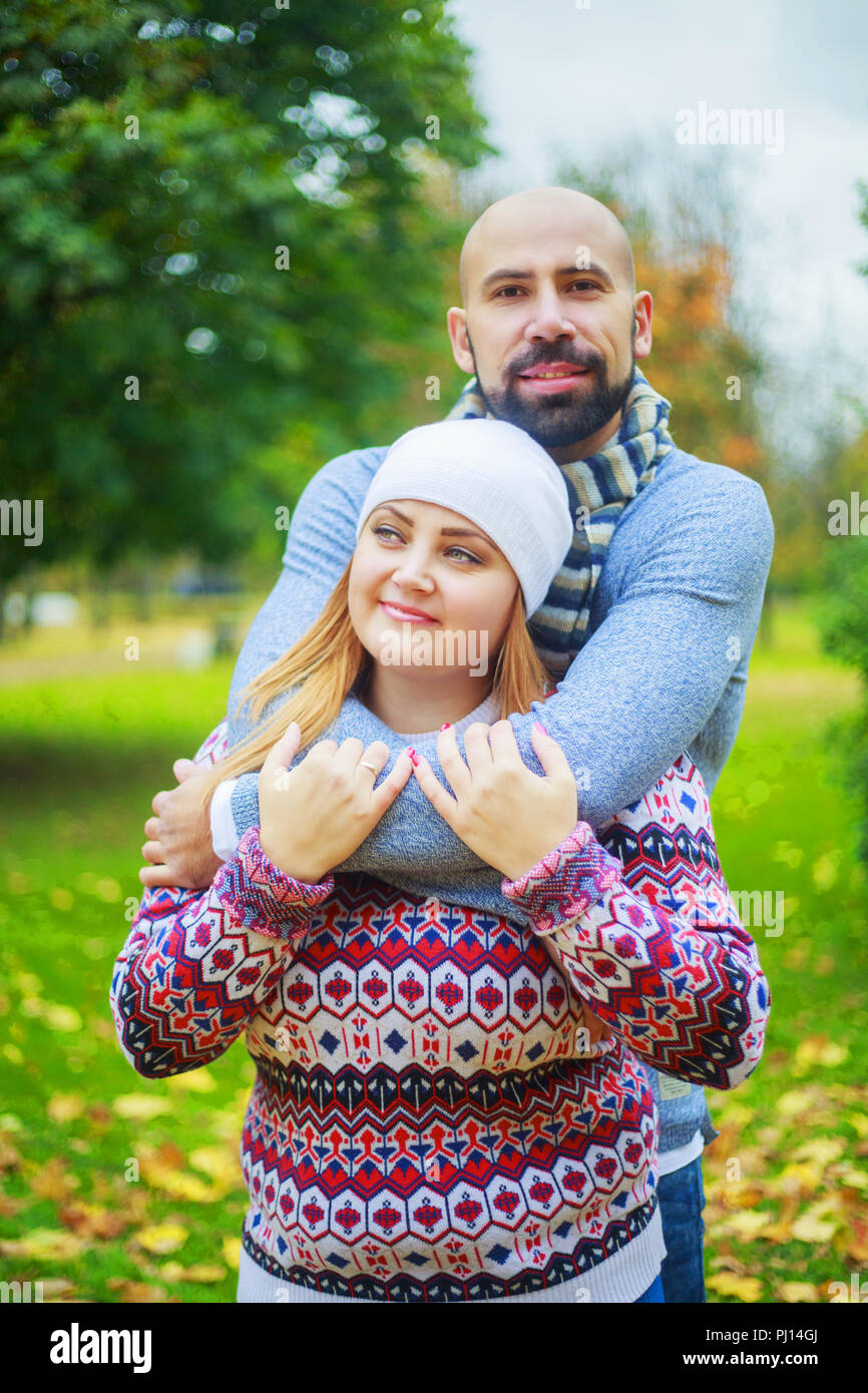happy young couple walking and having fun in the autumn park Stock ...
