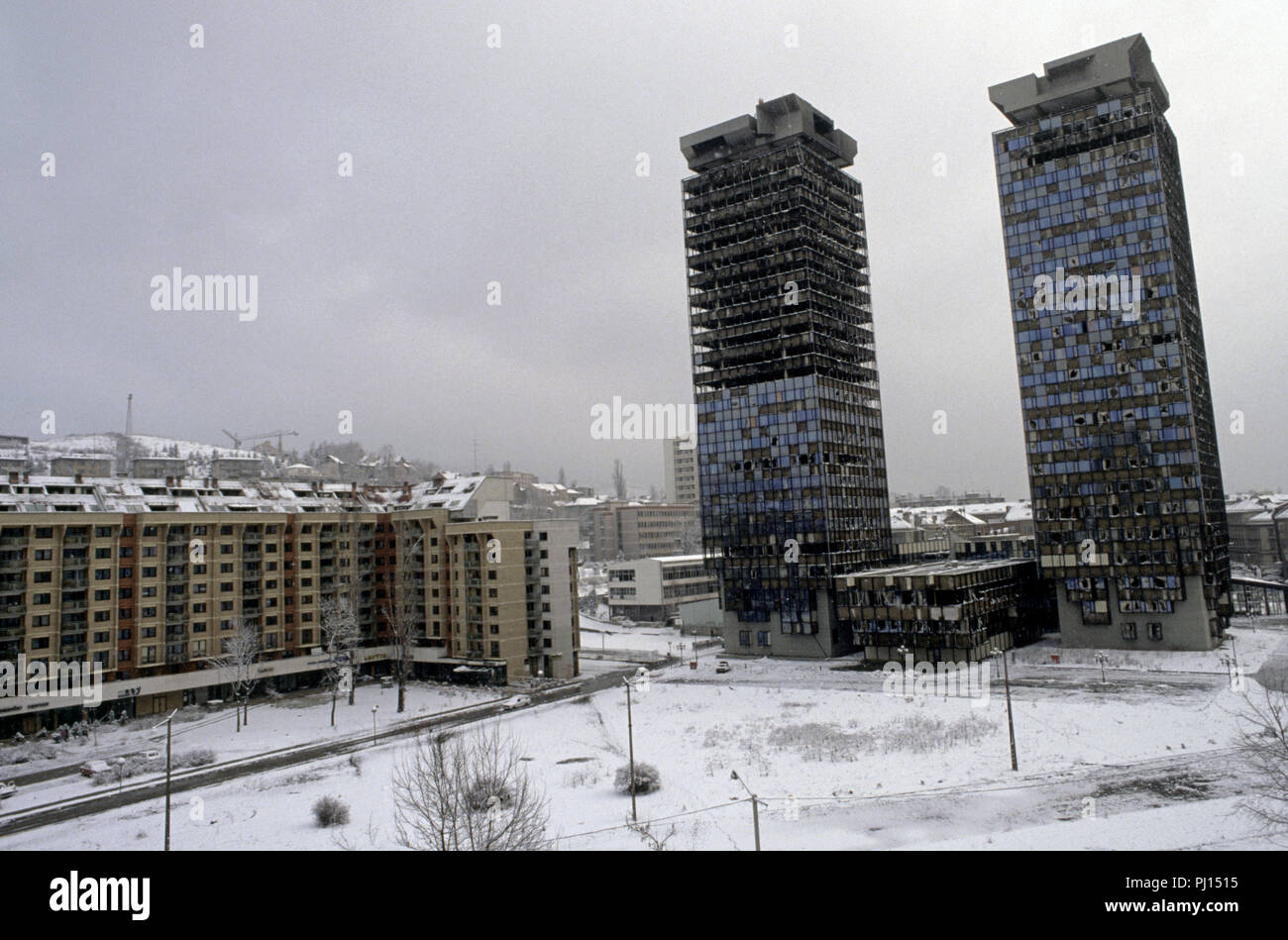 4th March 1993 During the Siege of Sarajevo: the war-damaged twin Unis Towers. The towers were built in the 1980s and were nicknamed 'Momo' and 'Uzeir', a Serb and a Bosniak, after characters in a radio comedy. Stock Photo