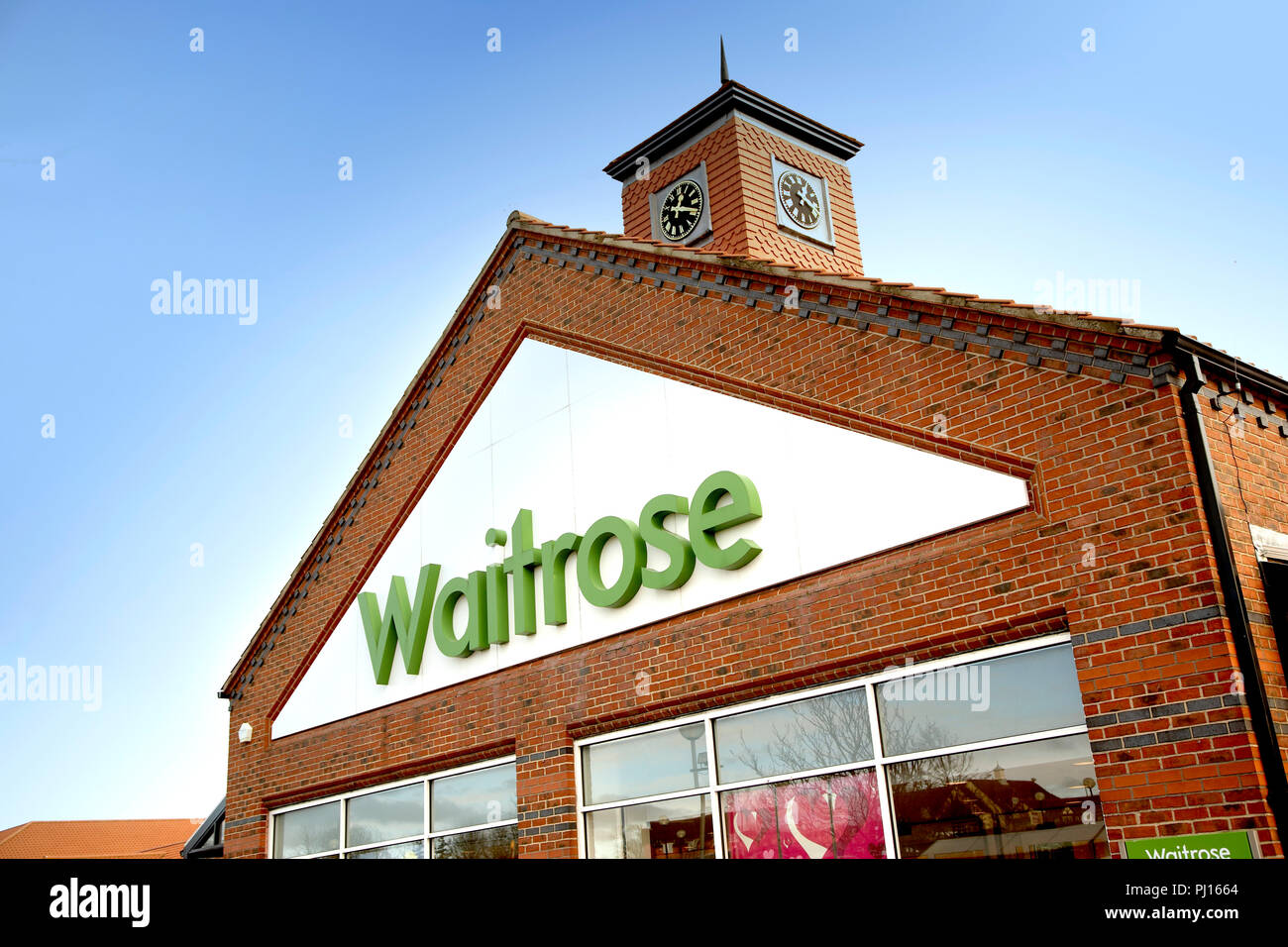 Waitrose sign on store front Stock Photo Alamy