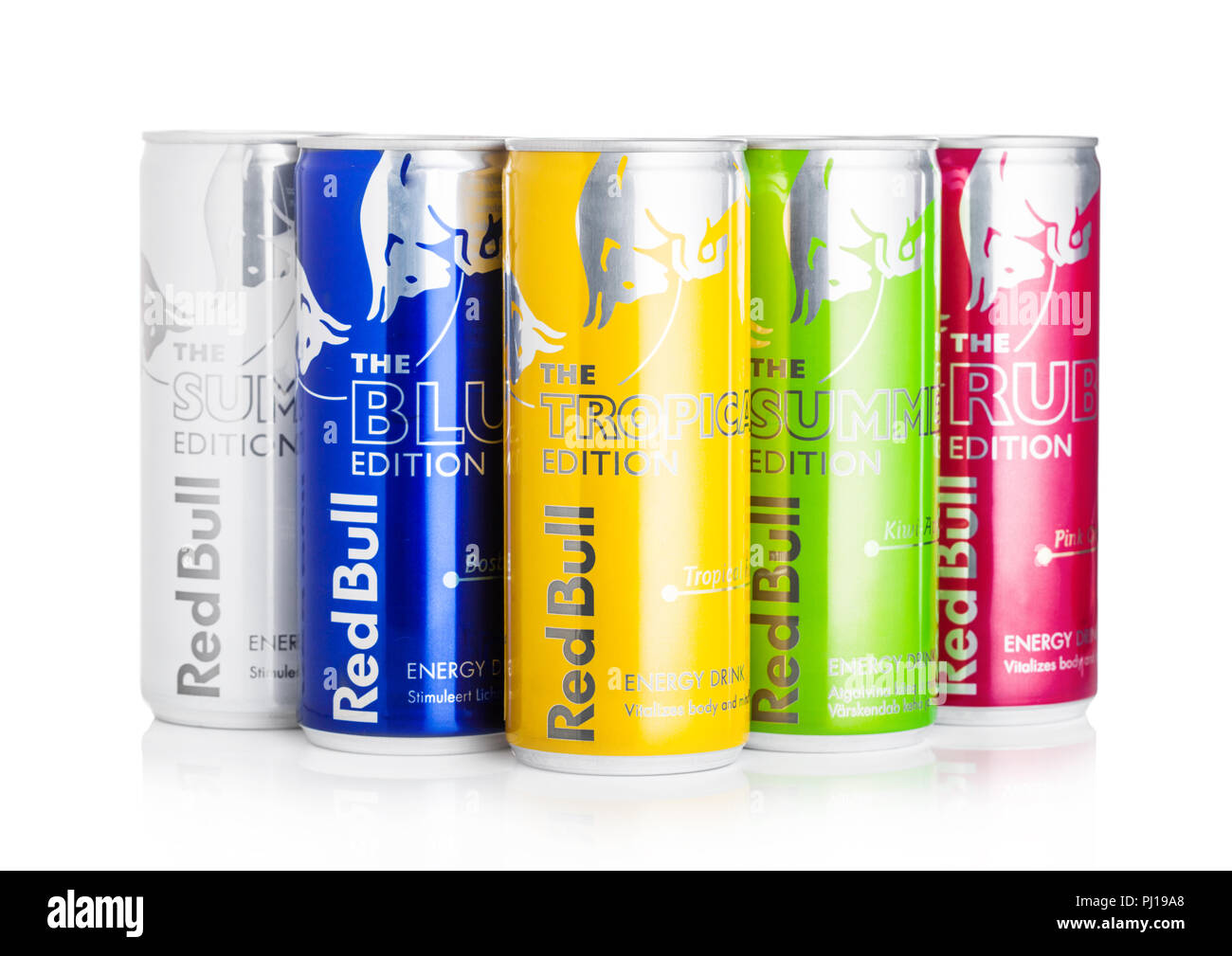 LONDON, UK - SEPTEMBER 03, 2018: Aluminium tins of Summer edition Red Bull Energy Drink on white background reflection. Red Bull is the most popu Stock Photo - Alamy