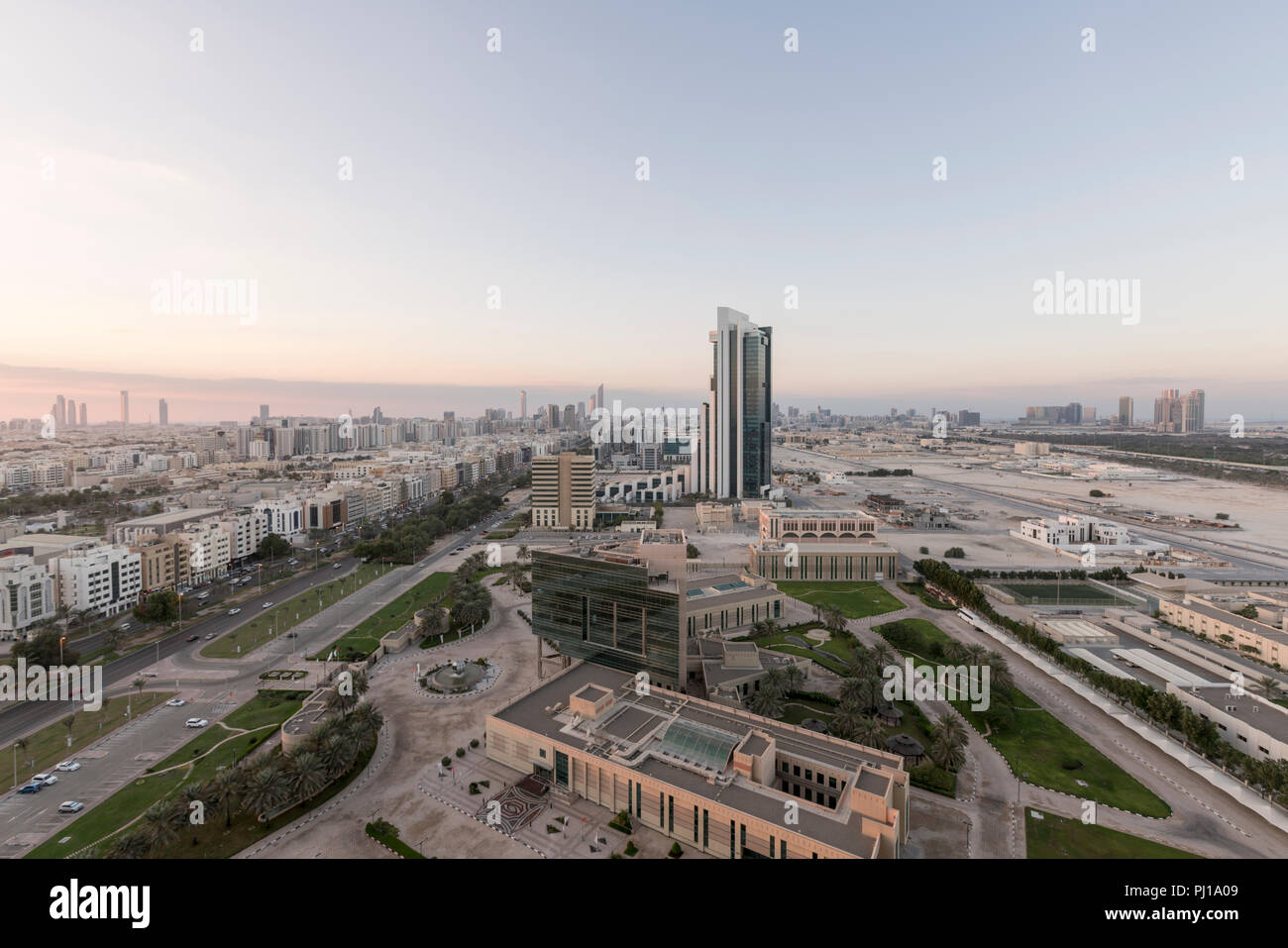 Looking towards downtown Abu Dhabi, with a view of skyscrapers and low-rise buildings, on the main Abu Dhabi Island, UAE Stock Photo