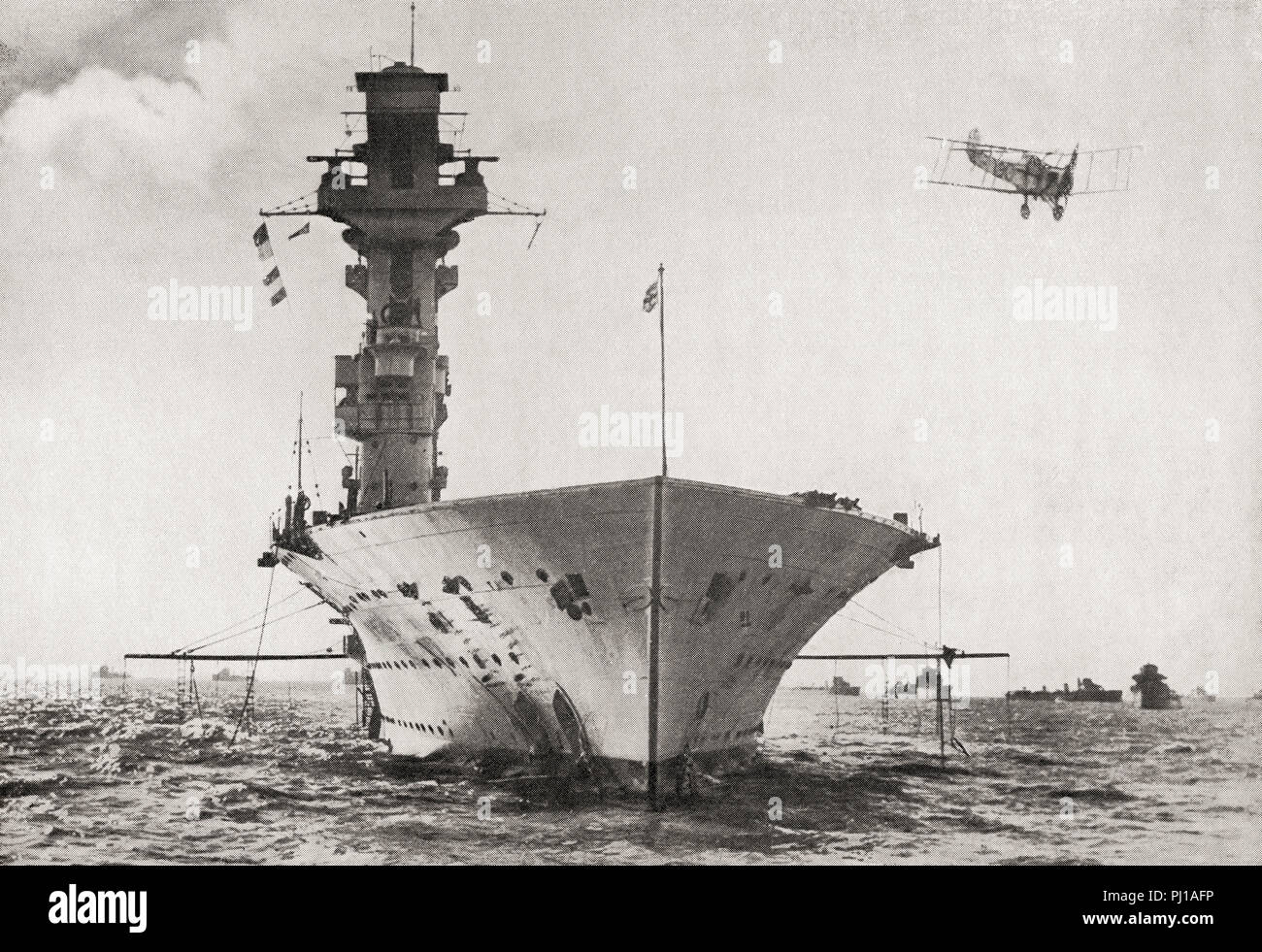 HMS Hermes, a British aircraft carrier built for the Royal Navy, the world's first ship to be designed as an aircraft carrier, she was sunk by Japanese aircraft, 9 April 1942.  From The Book of Ships, published c.1920. Stock Photo