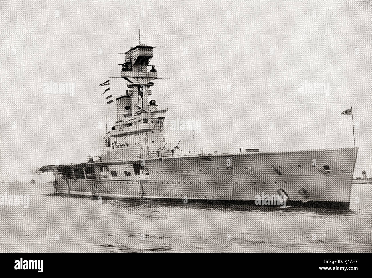 HMS Hermes, a British aircraft carrier built for the Royal Navy, the world's first ship to be designed as an aircraft carrier, she was sunk by Japanese aircraft, 9 April 1942.  From The Book of Ships, published c.1920. Stock Photo