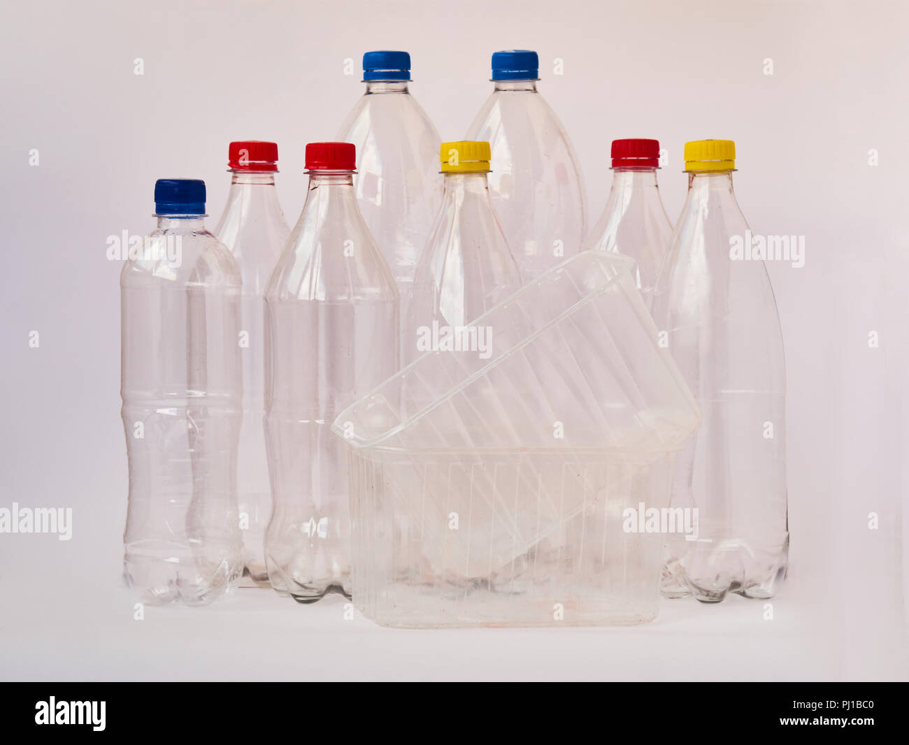 Empty plastic drinking bottles ready for recycling. Environmental protection concept. Empty