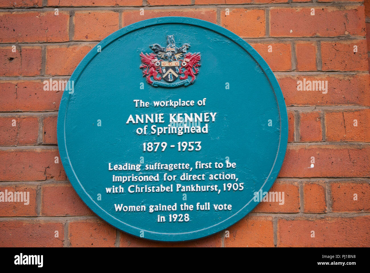 A blue plaque in honour of a leading suffragette Annie Kenney 1879-1953 on  the wall of Lees Brook Mill,Lees, Oldham,Lancashire, England. UK Stock  Photo - Alamy