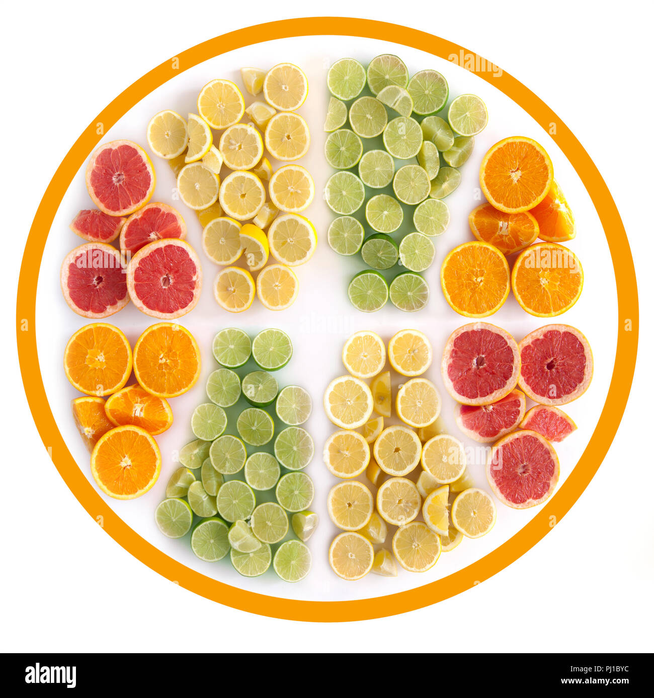 Many fruits in the shape of a sliced citrus including oranges, grapefruits, lemons and limes Stock Photo