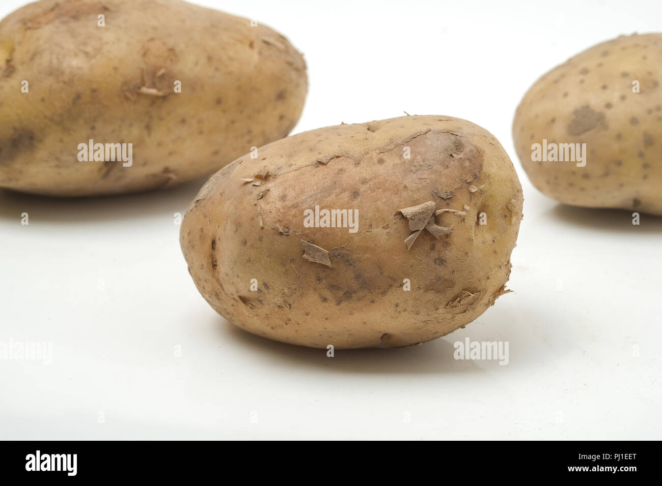 fresh potato white background Stock Photo Alamy
