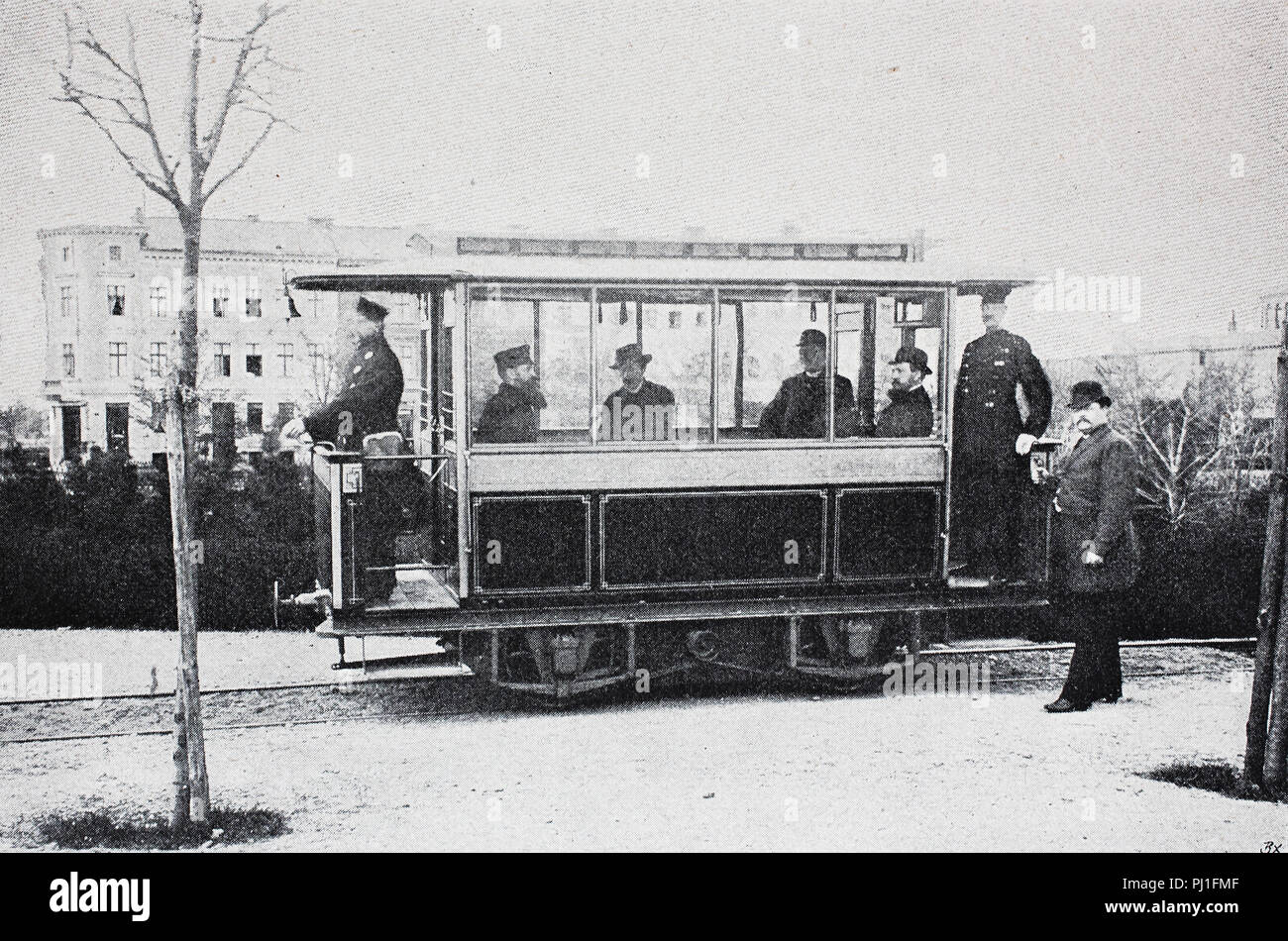 The Gross Lichterfelde Tramway was the world's first electric tramway,s built by the Siemens & Halske company in Lichterfelde, Berlin, and went in service on 16 May 1881, Germany, digital improved reproduction of an woodprint from the year 1890 Stock Photo