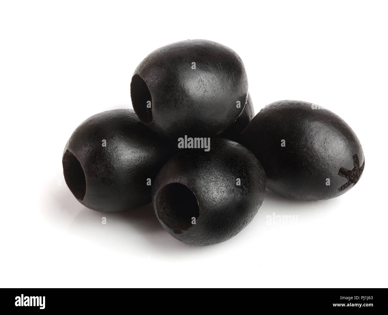 whole black olives isolated on white background macro Stock Photo Alamy
