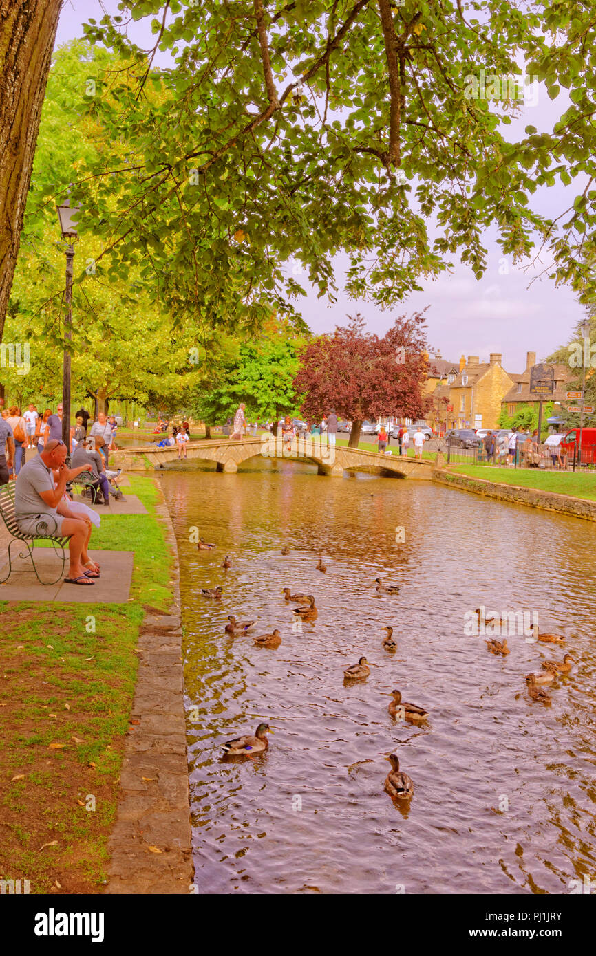Cotswolds village Bourton on the Water and the River Windrush in Gloucestershire, England, UK. Stock Photo
