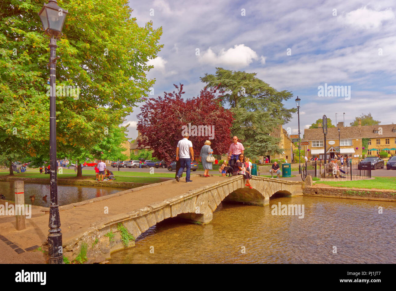 Cotswolds village Bourton on the Water and the River Windrush in Gloucestershire, England, UK. Stock Photo