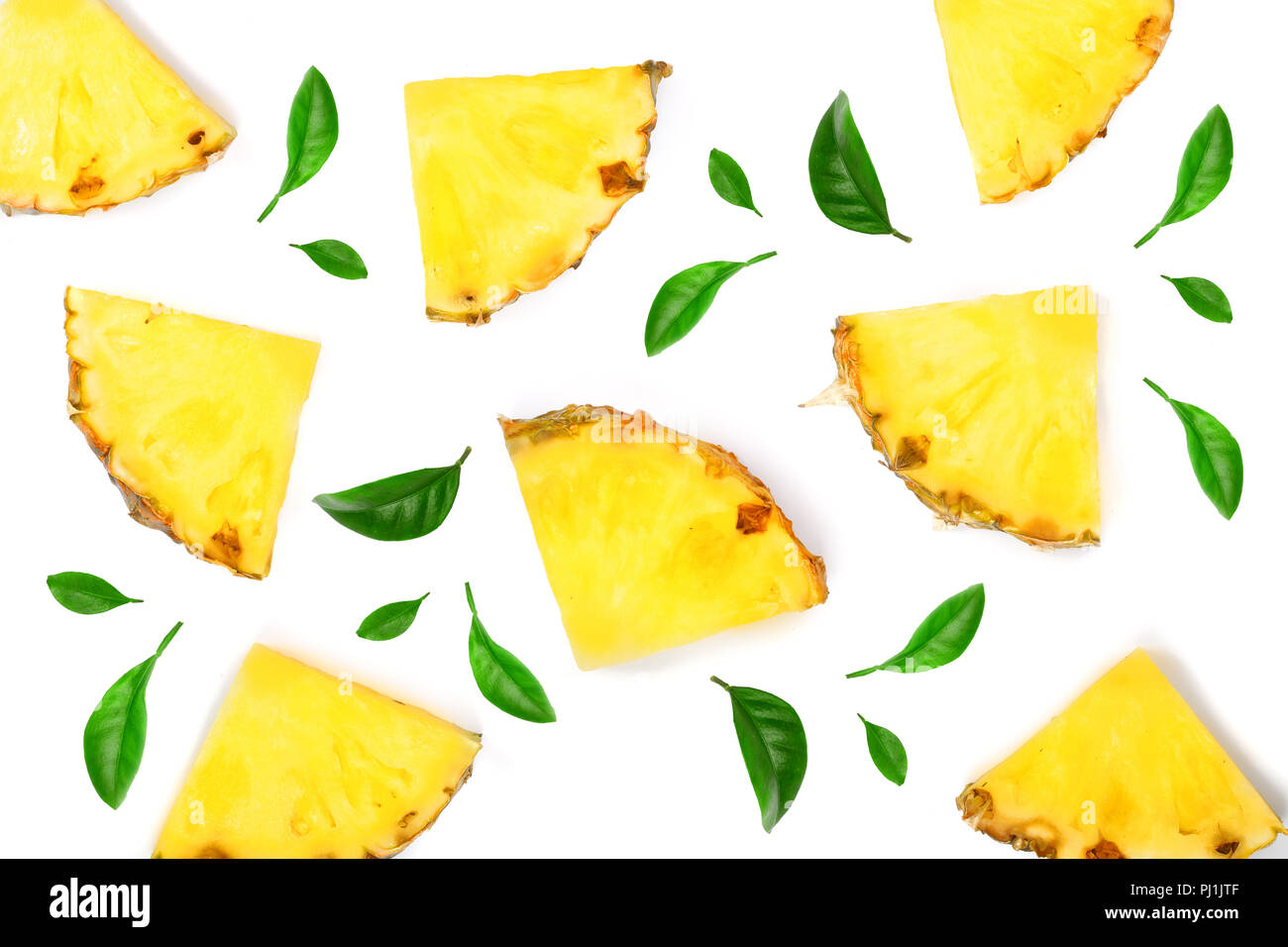 Sliced pineapple decorated with leaves isolated on white background ...