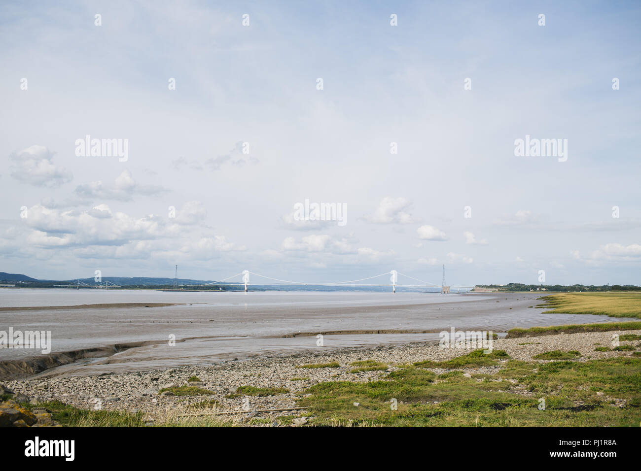 View of the Severn Bridge and the River Severn at low tide from the English side. Suspension Bridge. Tolls due to end in 2018. M48 motorway Stock Photo