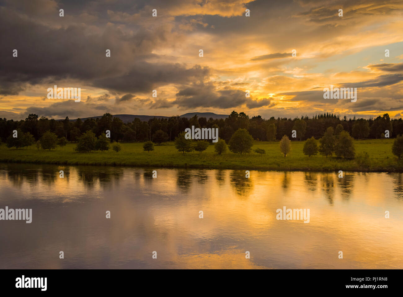 Sun Setting Over River, Scotland Stock Photo