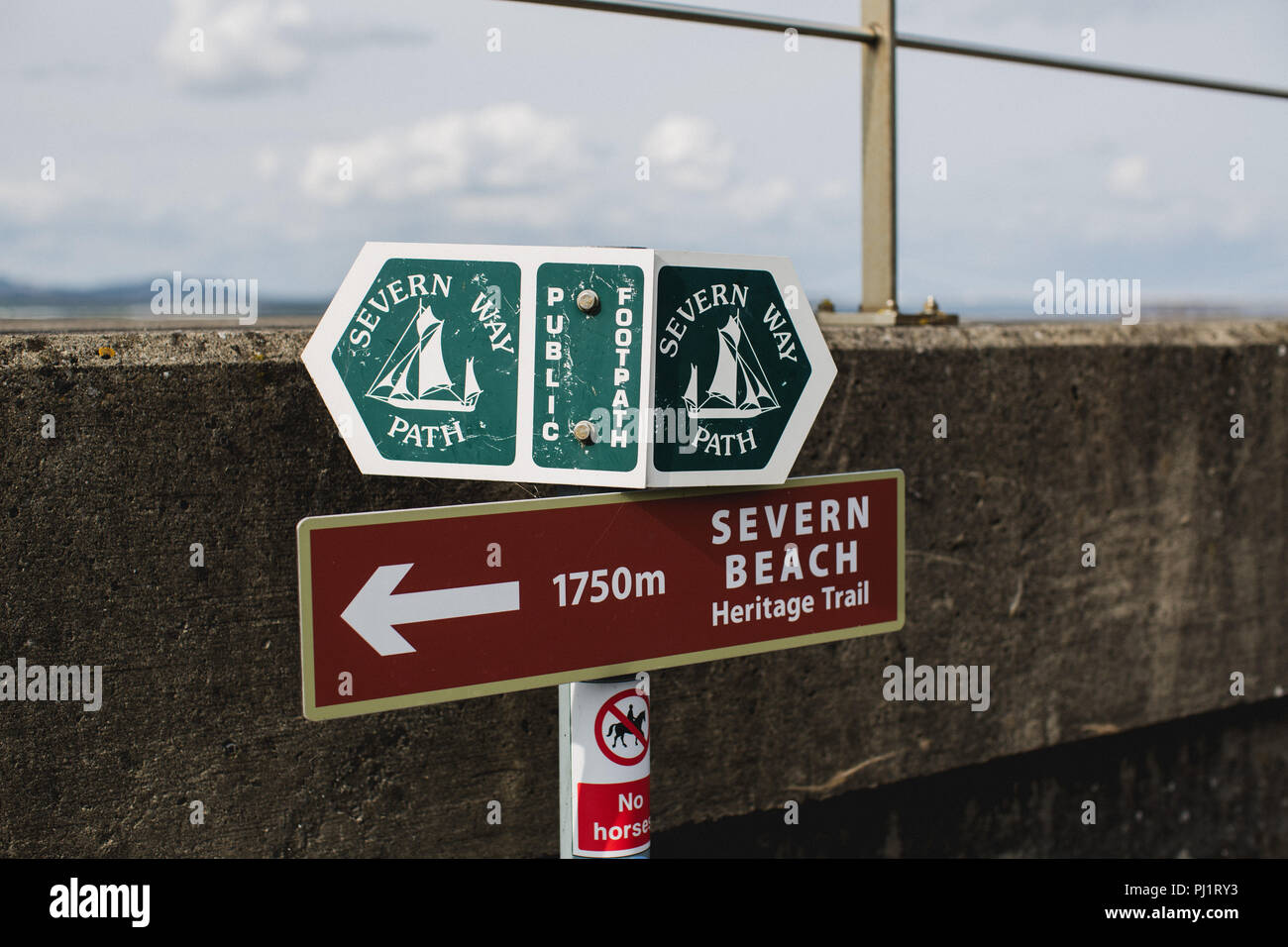 Sign post on the Severn Way public footpath (long distance coastal walk) with directions to Severn Beach Heritage Trail Stock Photo