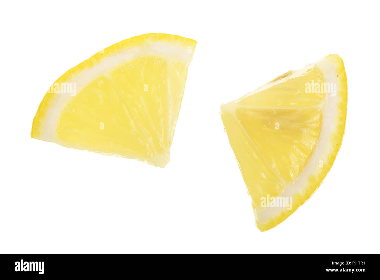 lemon slice isolated on white background closeup. Stock Photo