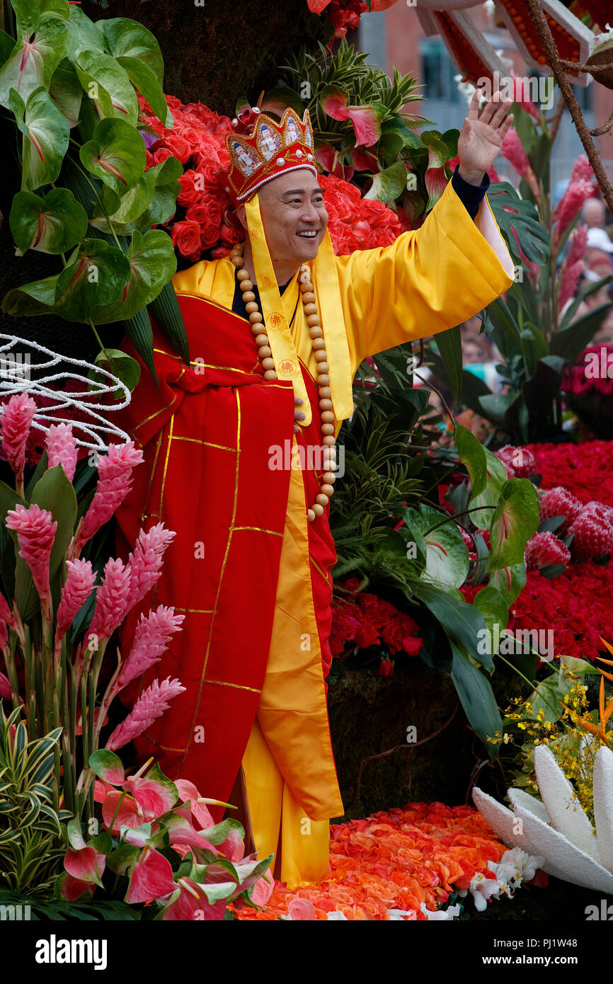A man waves from a float on the route of the 2017 Tournament of Roses Parade, Rose Parade, Pasadena, California, United States of America Stock Photo