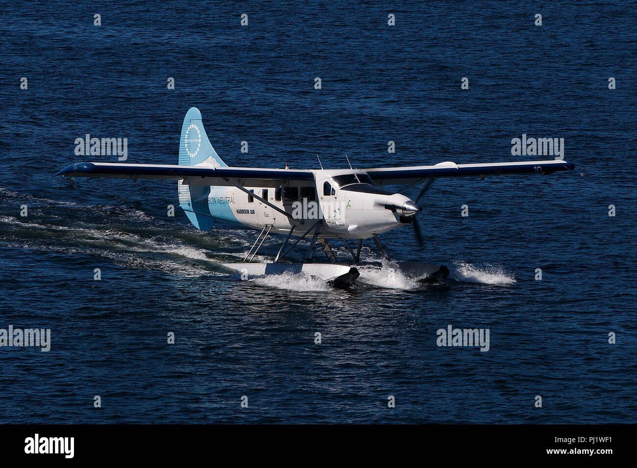 De Havilland Canada DHC-3T Otter (C-GHAS) operated by Harbour Air with the Fly Carbon Neutral Livery, Vancouver Harbor, Vancouver, British Columbia, Canada Stock Photo