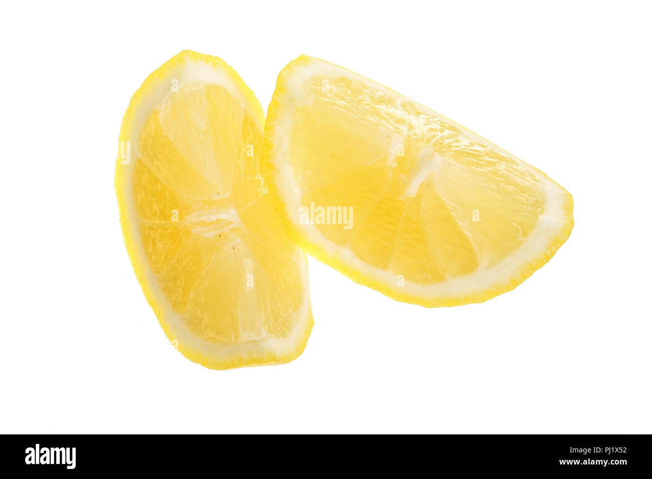 lemon slice isolated on white background closeup. Stock Photo