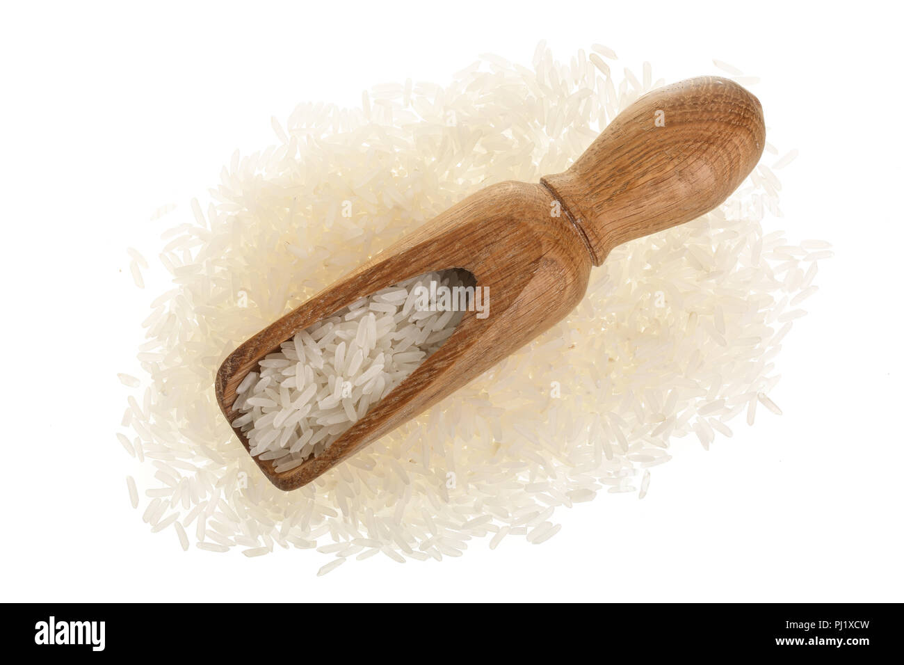 rice grains in wooden scoop isolated on white background. Top view ...