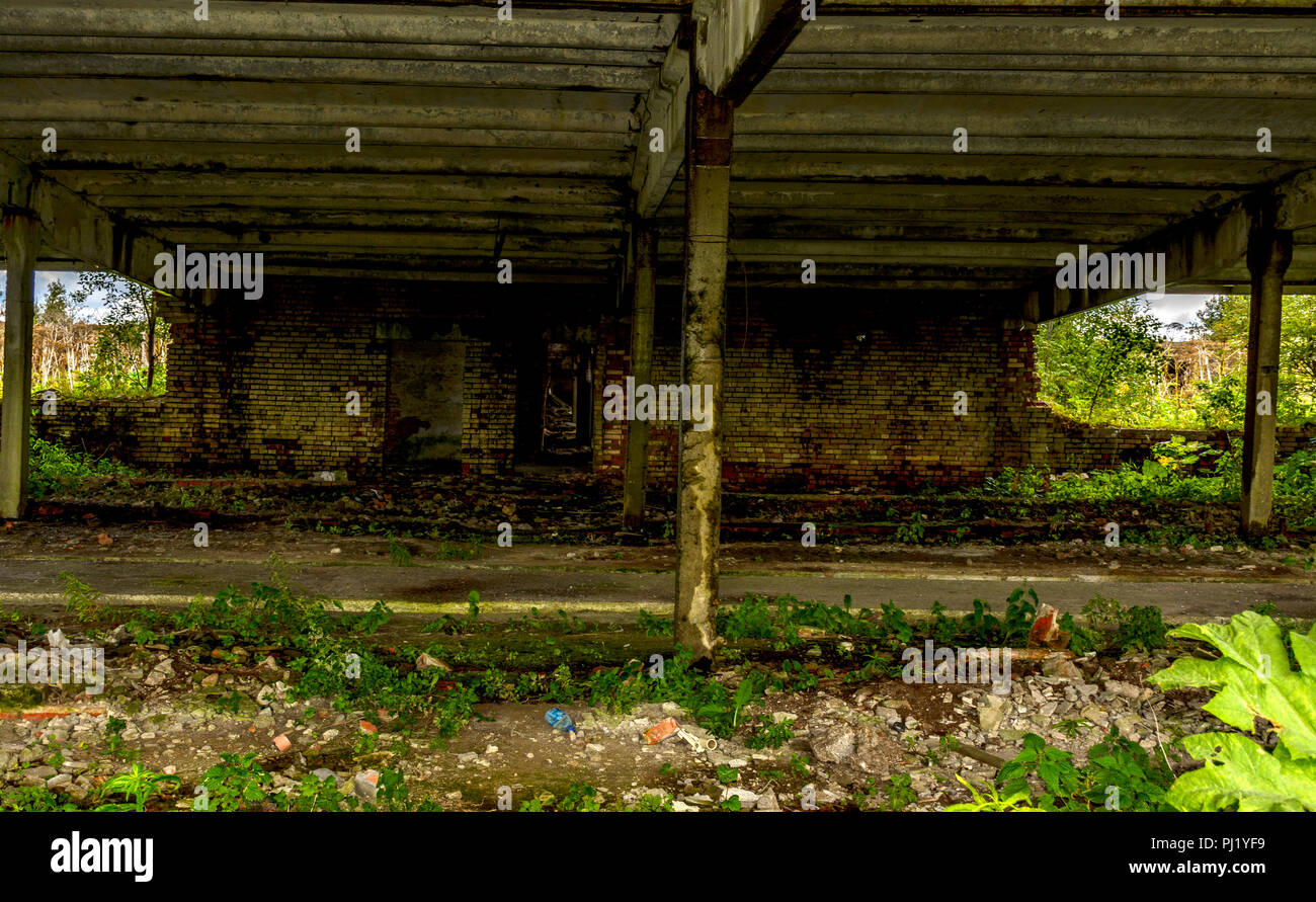 Abandoned agricultural buildings near the village of Muya in the Leningrad region Stock Photo