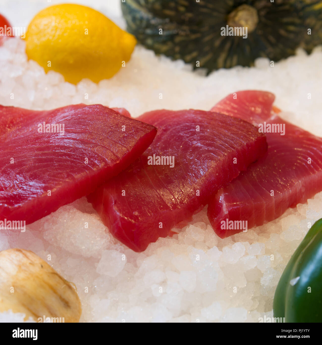 Fresh salmon fillet on ice with fruit Stock Photo - Alamy