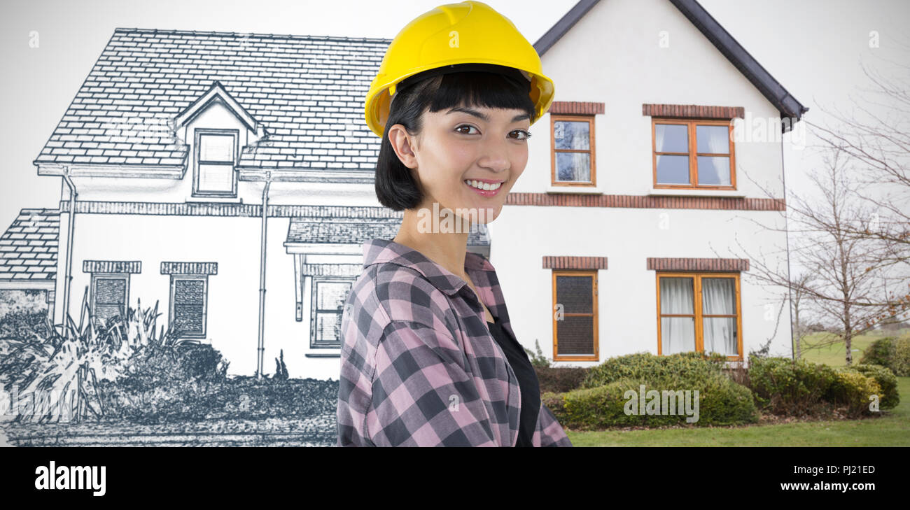Composite image of female architect in hard hat standing against white background Stock Photo
