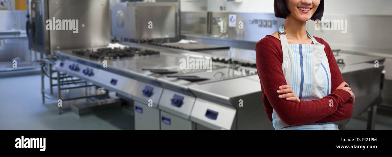 Smiling waitress standing arms crossed hi-res stock photography and ...