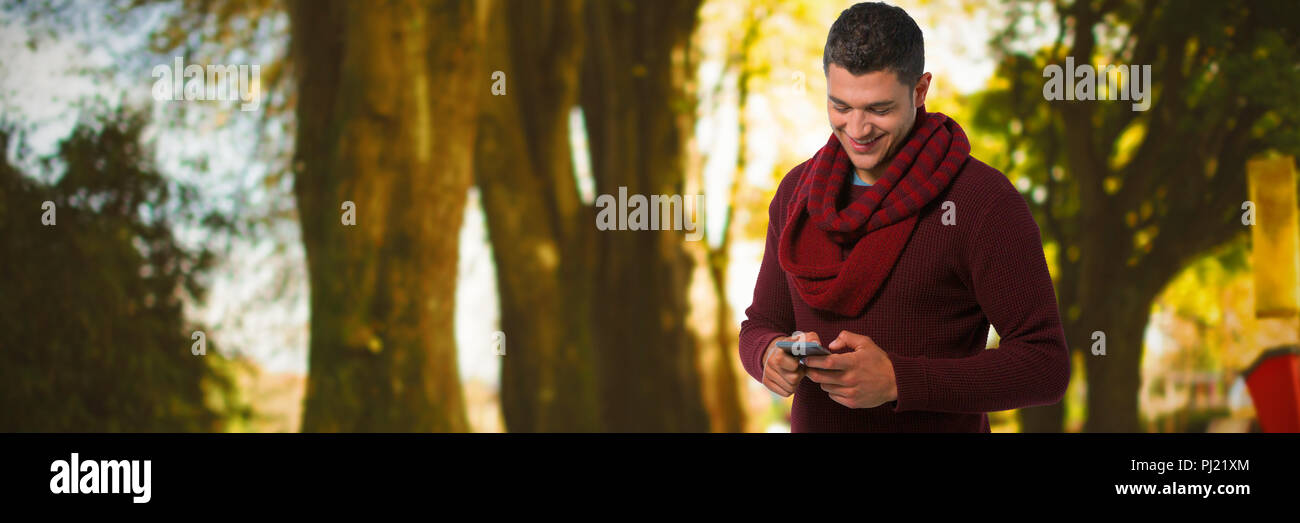 Composite image of man using mobile phone Stock Photo