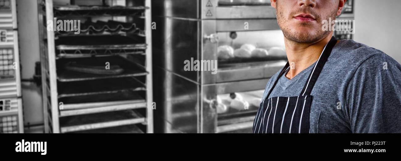 Composite image of male waiter standing Stock Photo