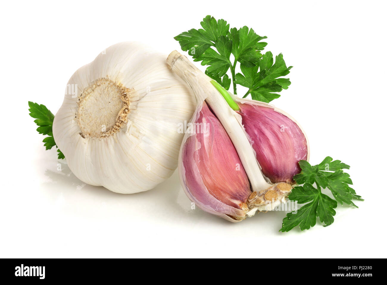 garlic with parsley leaf isolated on white background Stock Photo - Alamy