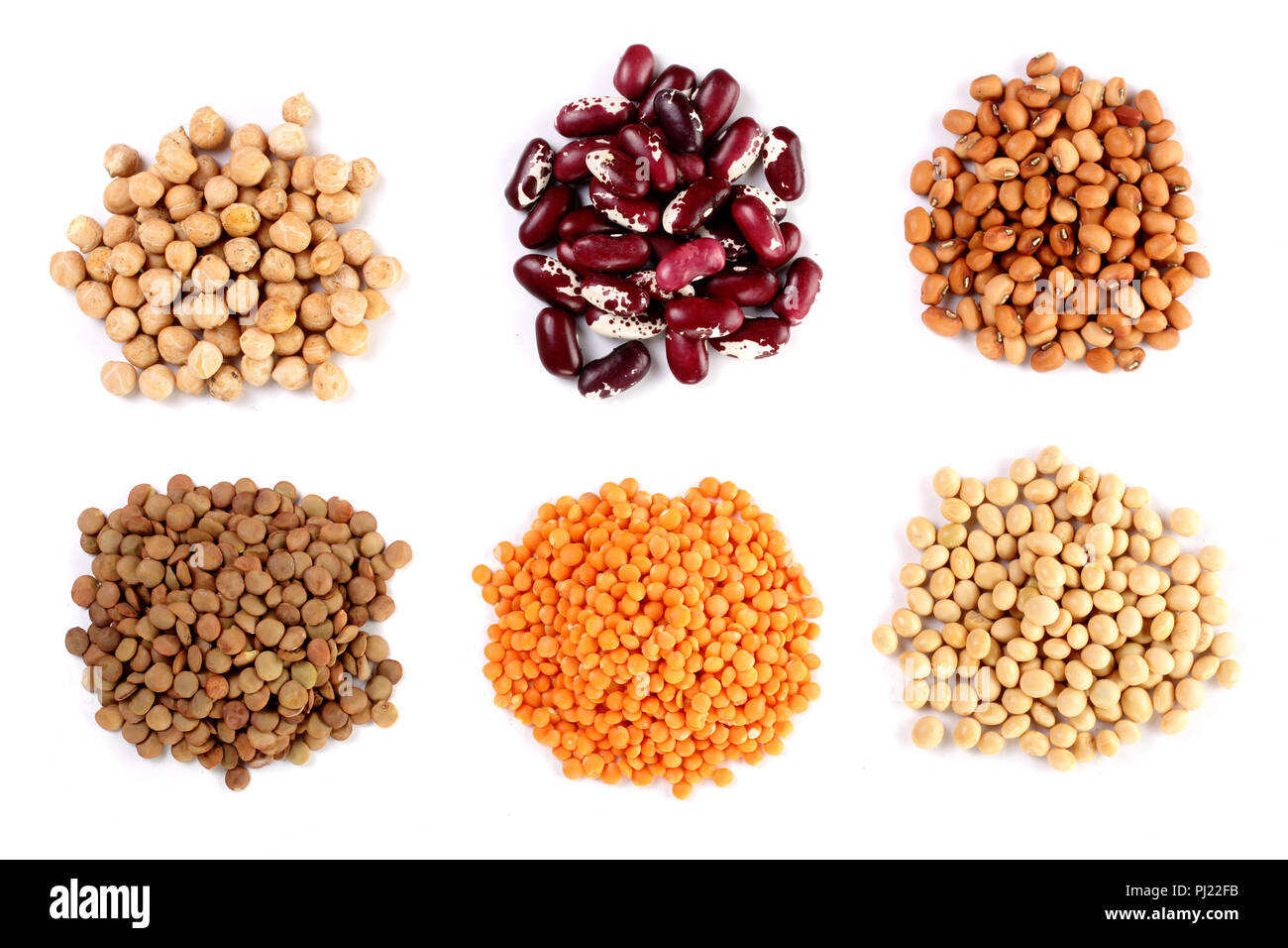 Collection set of Various dried kidney legumes haricot beans, soybeans, lentils, chickpeas close up isolated on white background. Stock Photo