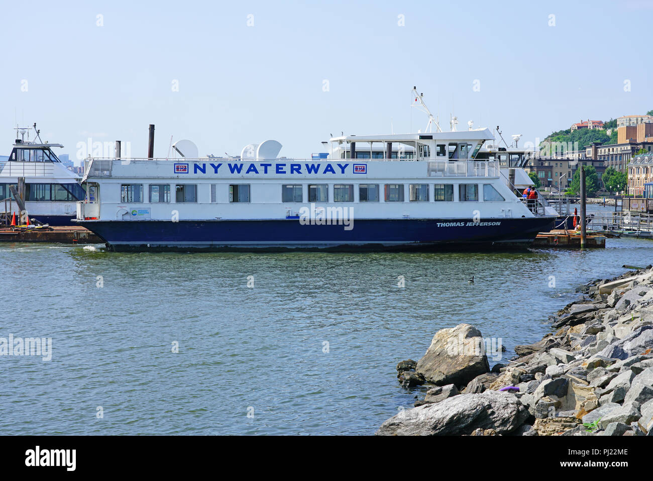 View of the NY Waterway ferry terminal at Port Imperial in Weehawken, a transit hub on the waterfront of the Hudson River in New Jersey Stock Photo