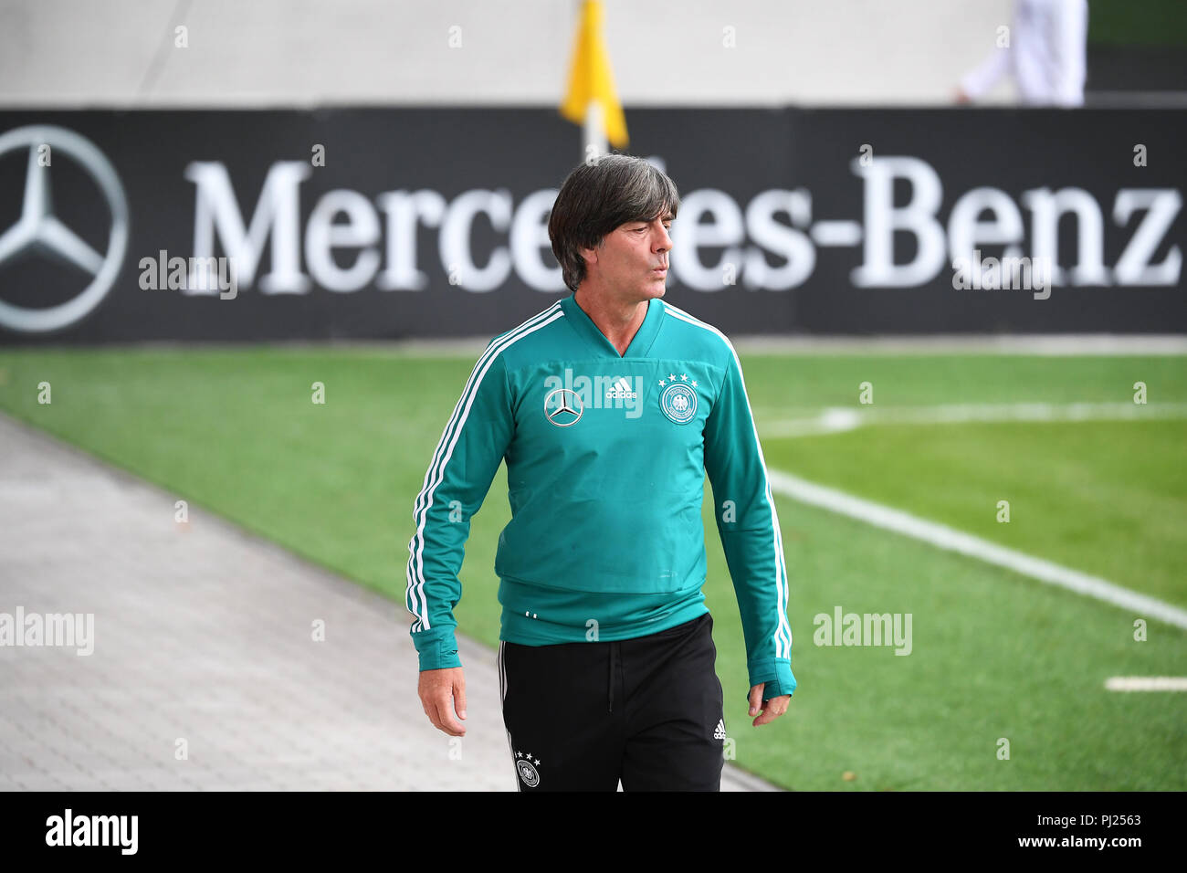 Federal coach Joachim Jogi Loew (Germany) on his way to training. GES / Football / Training of the German national football team in Muenchen, 03.09.2018 Football / Practice German National Football Team, Munich, September 3, 2018 | usage worldwide Stock Photo