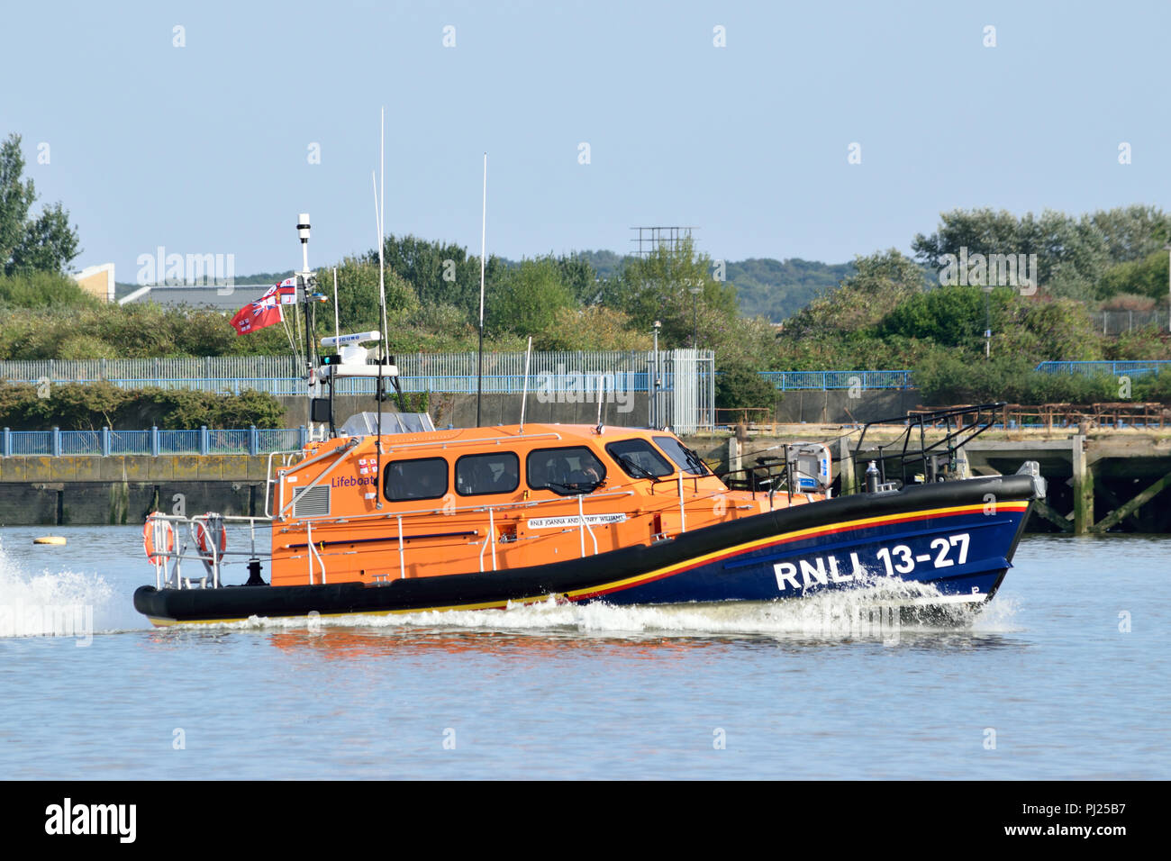 London, UK, 3rd September 2018 – The newest RNLI Shannon-class Lifeboat 13-27, called “Joanna and Henry Williams”, seen heading up the River Thames at speed as it heads to London. Credit: A Christy/Alamy Live News. Stock Photo