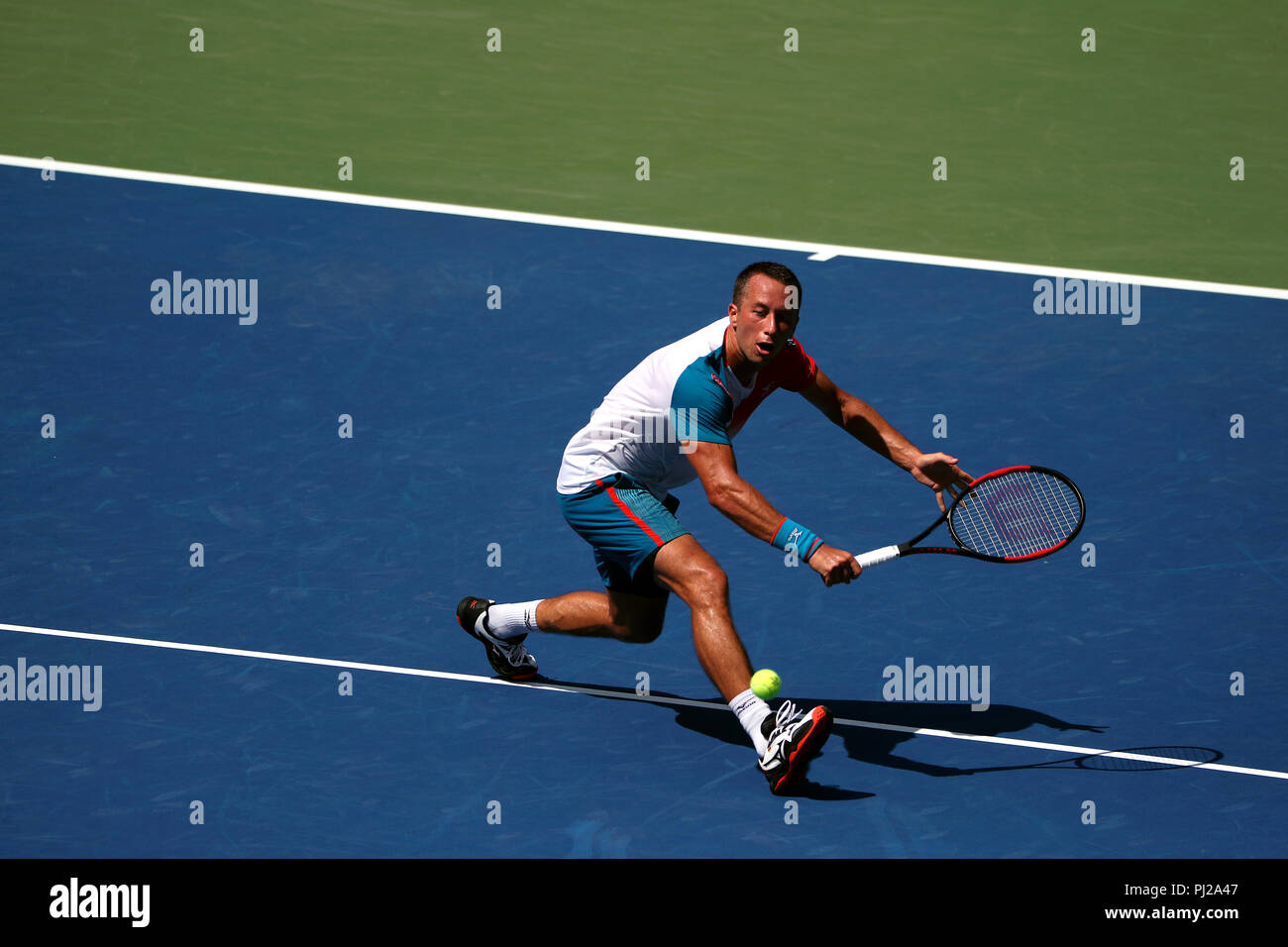 Flushing Meadows, New York - September 3, 2018: US Open Tennis: Philipp  Kohlschreiber of Germany in action against Kei Nihsikori of Japan during  their fourth round match at the US Open in