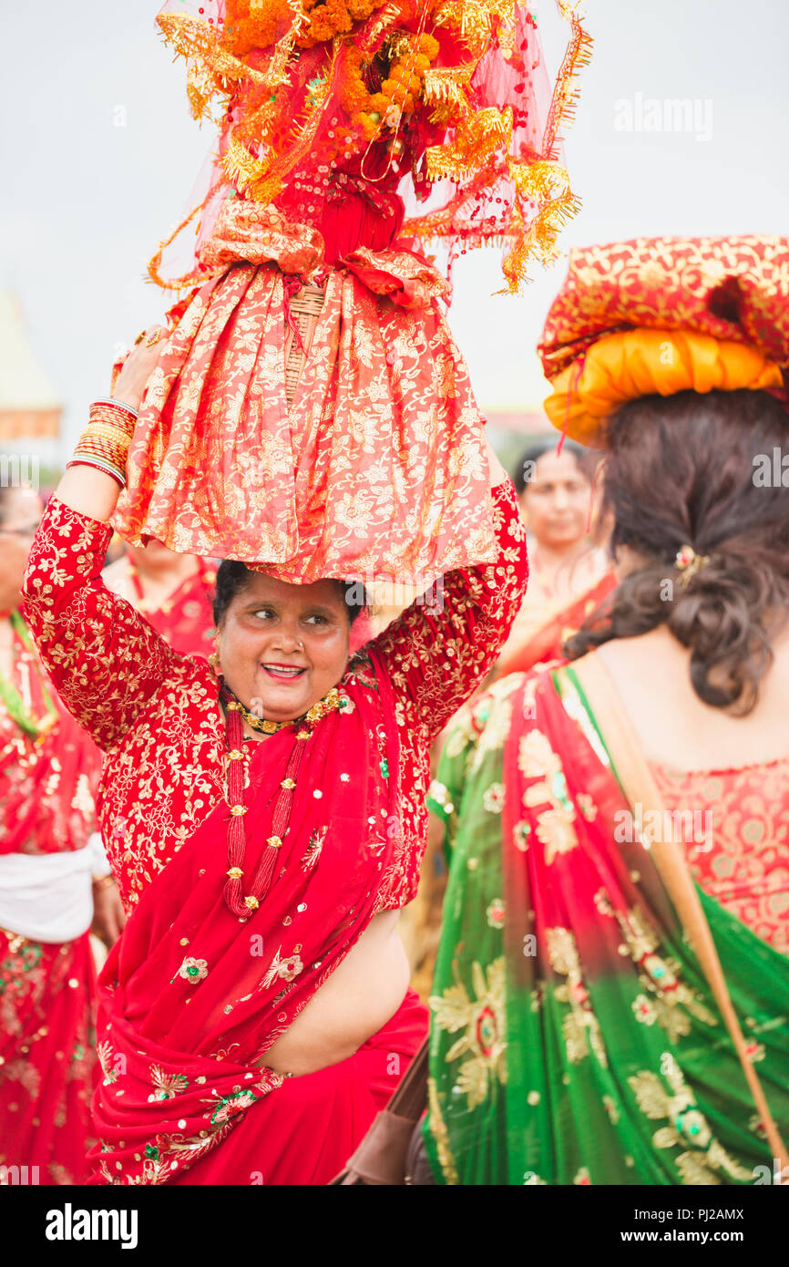 Kathmandu, Nepal. 3rd Sept 2018. Women dancing with Carrying Gaura on their Heads on the occasion of Gaura Festival in Kathmandu.The Gaura Festival is celebrated by the Hindu peoples residing in the especially most of middle-western & far-western part of Nepal.The festival of Gaura Parva is actually the ceremonies of the wedding of Goddess Gaura and Lord Maheswore.The deuda dance is major part of this festival in which participants hold hands and form a circle as they stepped to Credit: Nabaraj Regmi/Alamy Live News Stock Photo