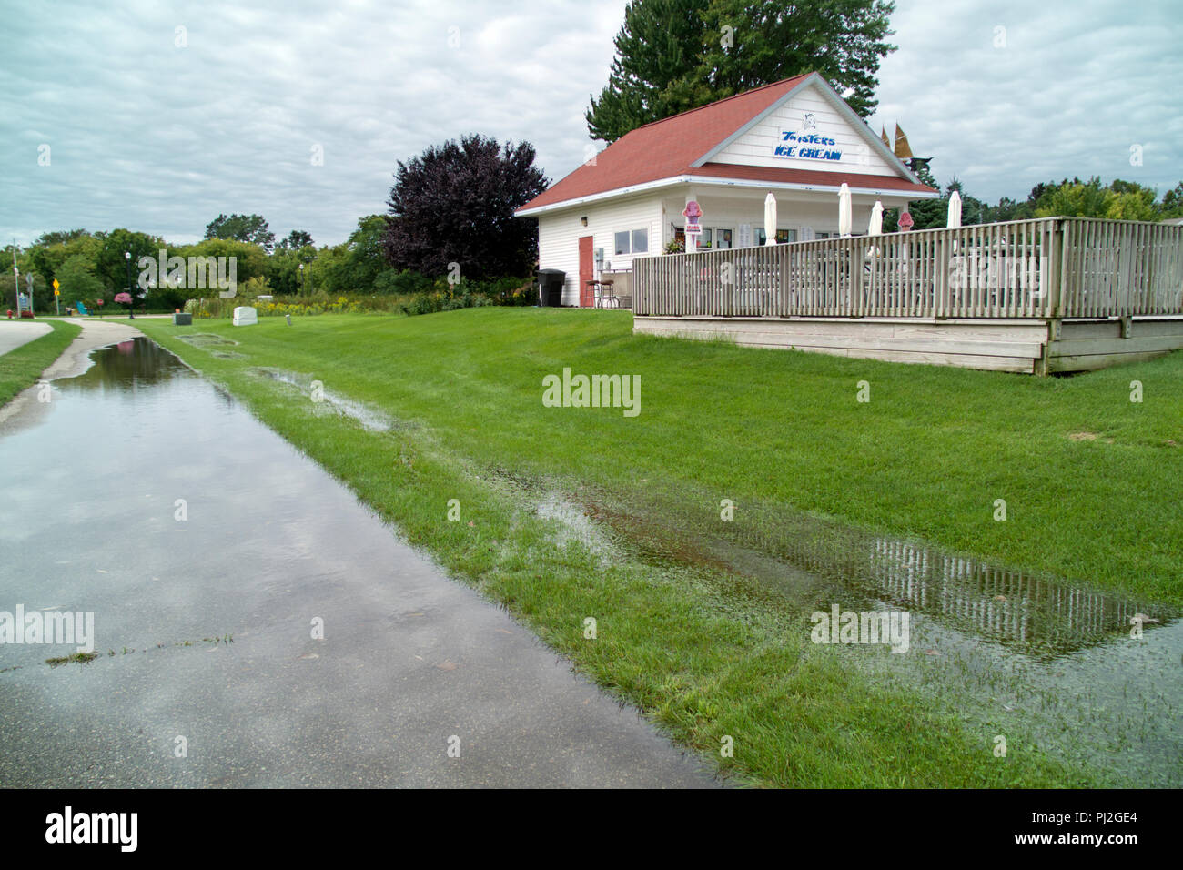 Standing water in Montague, Michigan after several days of heavy August rain. Stock Photo