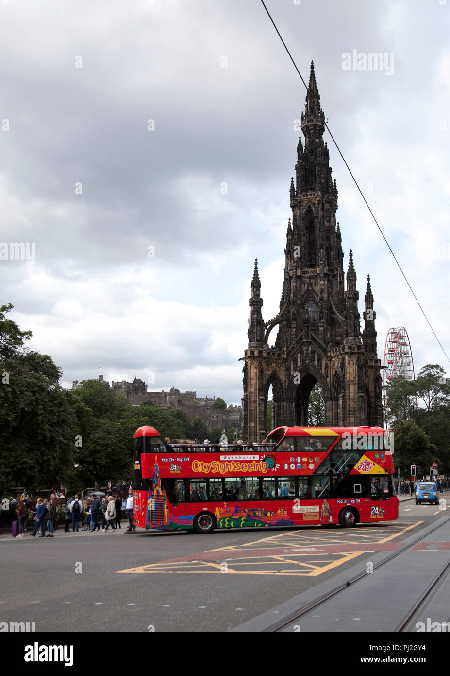 Red tourist bus, Edinburgh, Princes Street, Scotland, UK Stock Photo