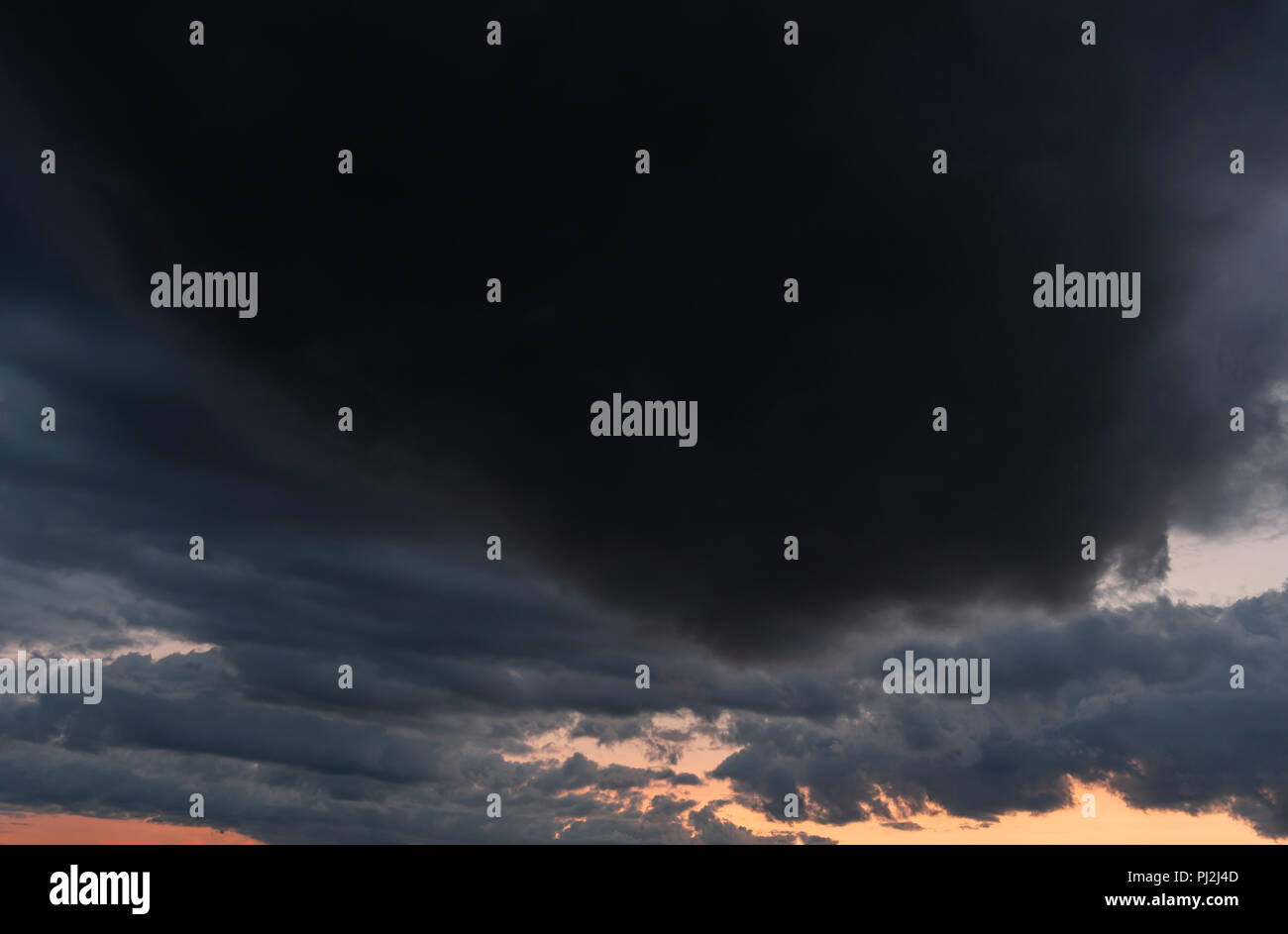 Sky background image with dark stormy clouds and the sunset Stock Photo ...