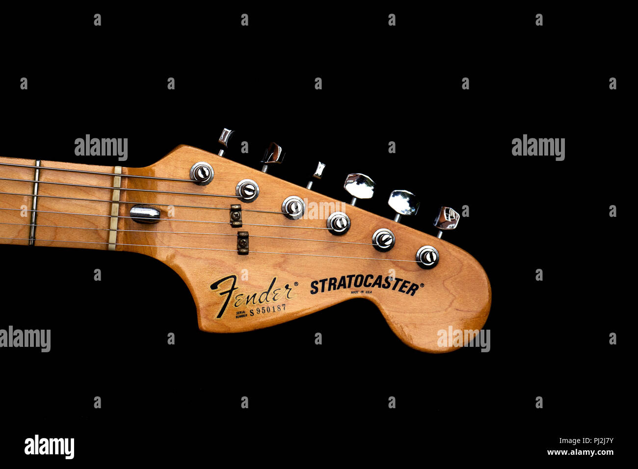 Headstock and pegs of a Fender Stratocaster Hardtail color California Wine. USA 1980 Stock Photo